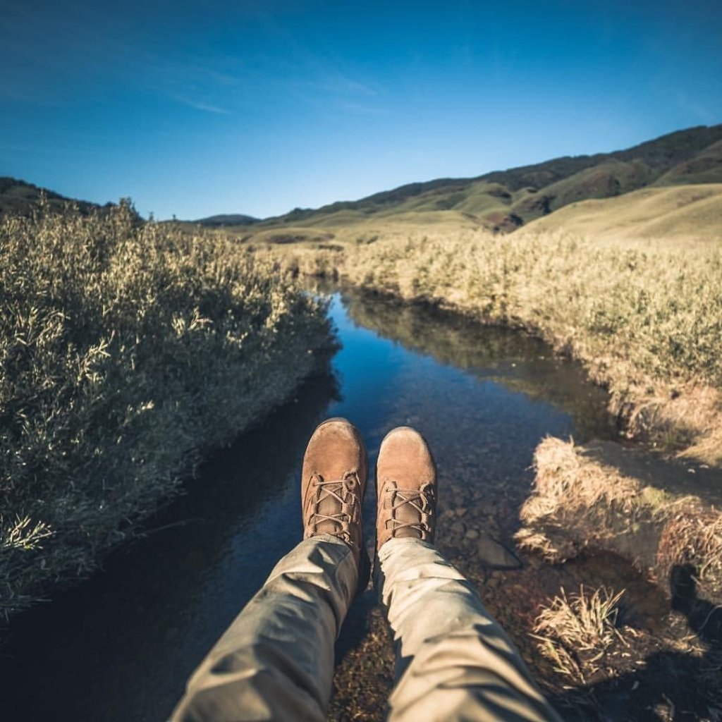 Man with nice boots chilling with nature Nature with Universe
