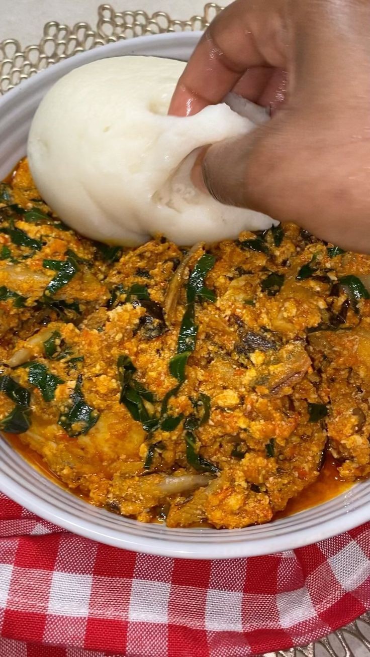 Pounded Yam and Egusi Soup with Stock Fish and&nbsp;Kpomo
